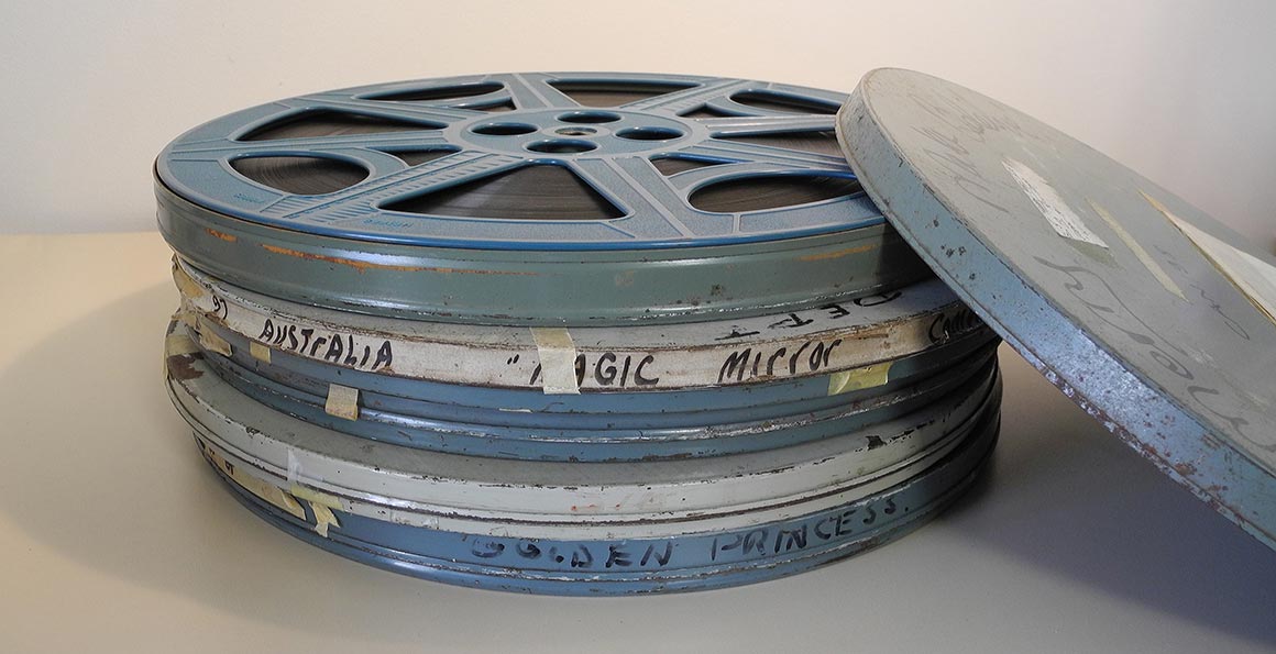 Photo of stack of 16mm film cans.